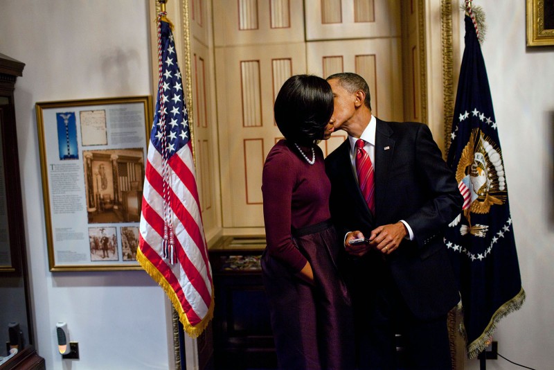 President Barack Obama Kisses First Lady Michelle Obama after hi