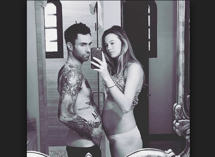 Adam Levine shares topless photo of wife, Behati Prinsloo showing her growing baby bump theinfong.com 700x511