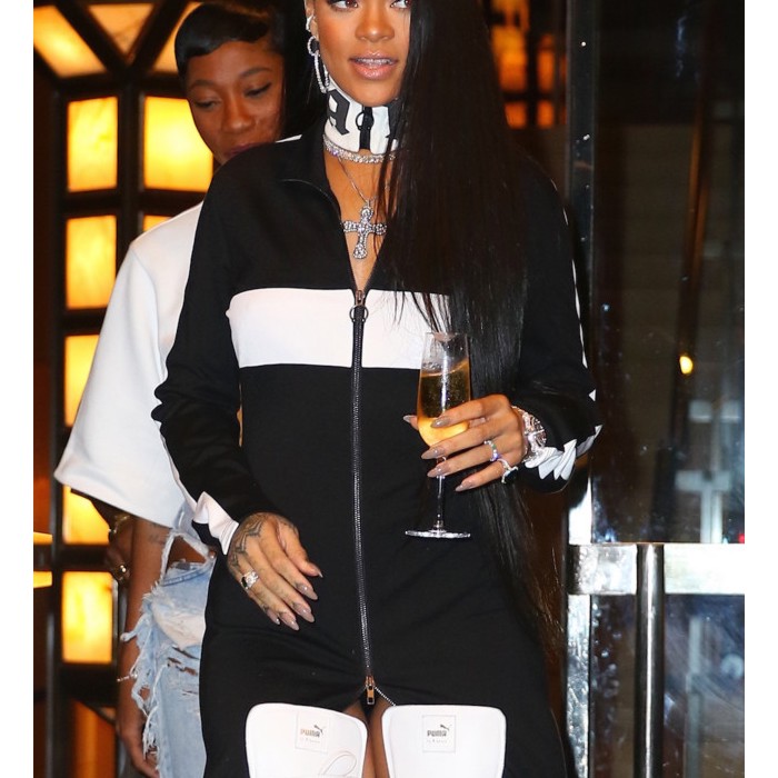 6.September.2016 - New York – USA **STRICTLY AVAILABLE FOR UK AND GERMANY USE ONLY** New York, NY - Rihanna totes a glass of champagne while heading out to Foot Locker for the launch of her new Puma line this evening in New York BYLINE MUST READ : AKM-GSI-XPOSURE ***UK CLIENTS - PICTURES CONTAINING CHILDREN PLEASE PIXELATE FACE PRIOR TO PUBLICATION *** *UK CLIENTS MUST CALL PRIOR TO TV OR ONLINE USAGE PLEASE TELEPHONE 0208 344 2007*