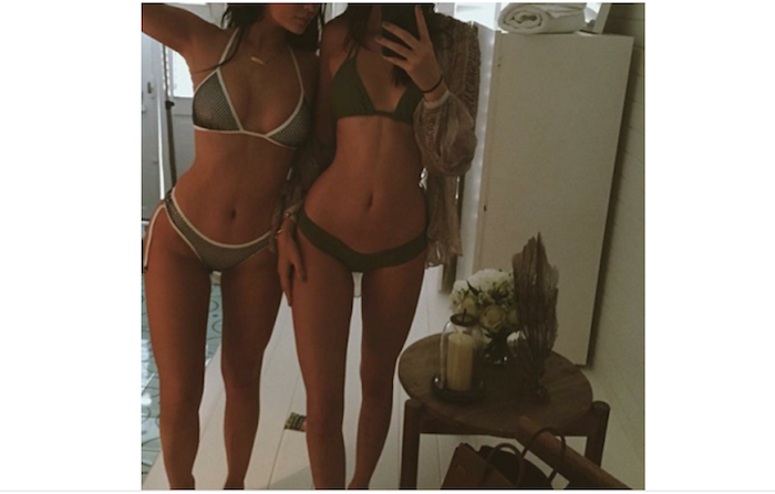 Kendall and Kylie Jenner strip to bikini to show off their bikini bods & it's got everyone talking (Photo) theinfong.com 700x447