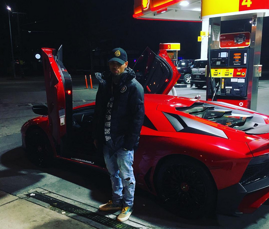 Chris Brown shares a photo of his red Lamborghini with powerful message theinfong.com