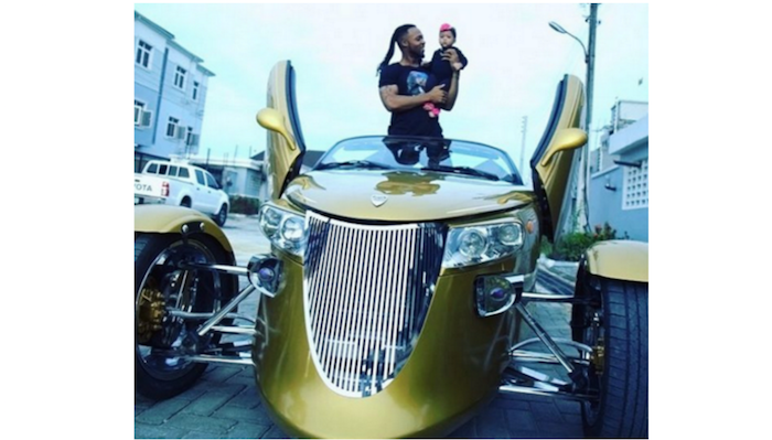 Flavour carries his cute daughter in a really weird car theinfong.com 700x399