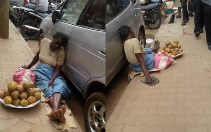 Heart-wrenching photos of an exhausted street trader who fell asleep on the road theinfong.com 700x439