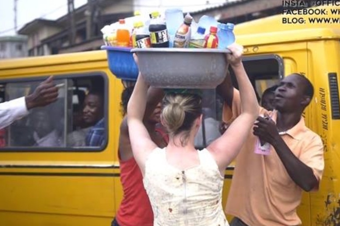 Nigerian man forces his white wife to sell pure water on the streets of Lagos theinfong.com - 700x467