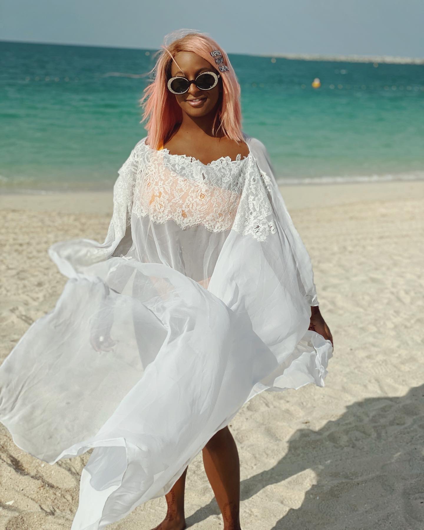 “This is rare” - Fans react as Dj Cuppy exposes her bum in bikini photos