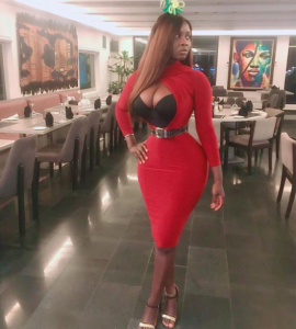 Sexy Gambian Ghana-based actress Princess Shyngle reveals her cleavage and tiny waist in new photo