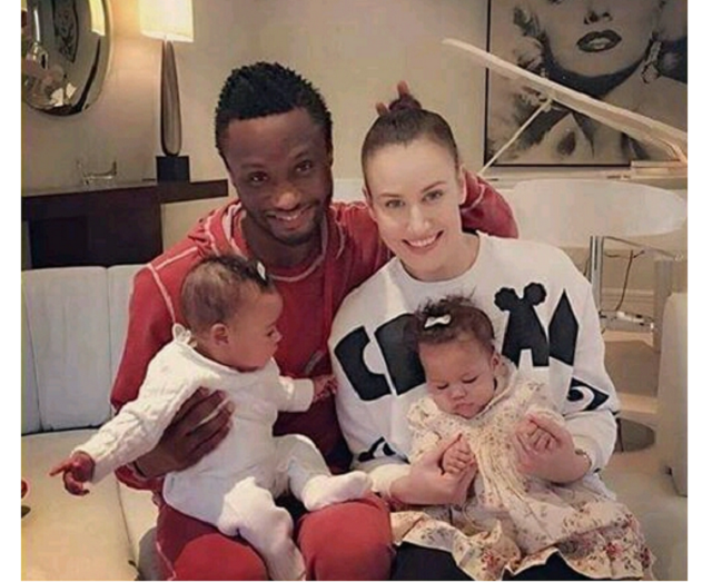 Mikel Obi with his girlfriend & their twin Daughters