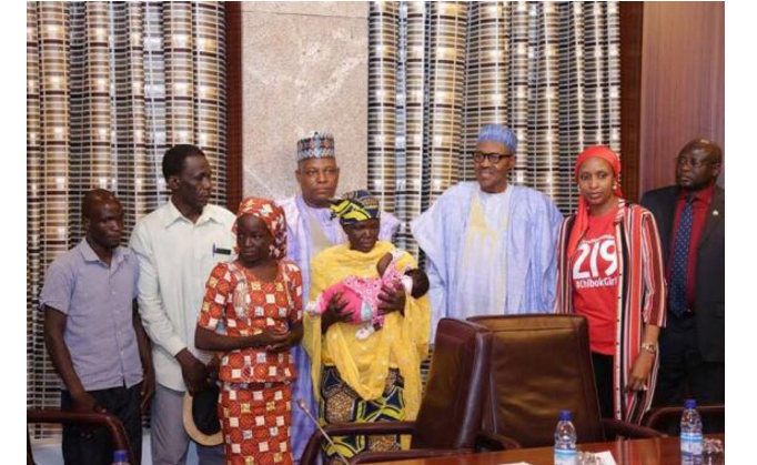 Buhari receives rescued Chibok Girl