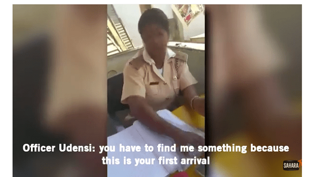 Immigration officer Udensi I L caught on tape