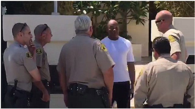 Dr. Dre arrested and handcuffed by police