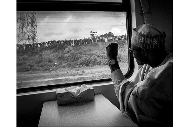 President Buhari rides the newly-commissioned Train