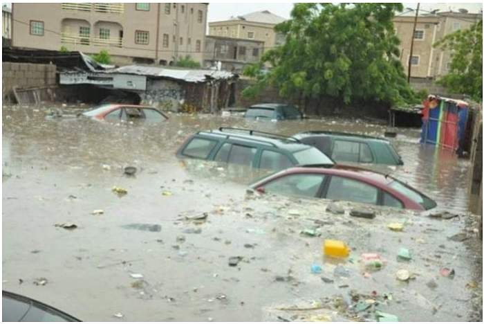 How massive flood swallowed cars parked in Kano