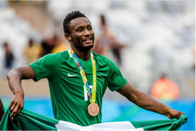 Mikel Obi celebrates bronze medal win