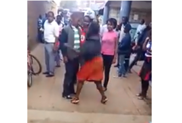 Woman beats up her husband in the middle of a street, accuses him of infecting her with STD
