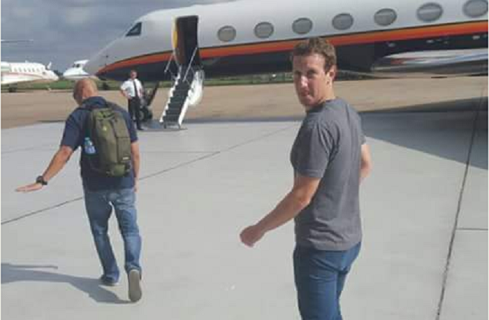 Mark Zuckerberg boarding a private jet