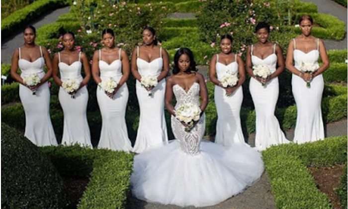 Bride and her bridesmaids dressed in all white