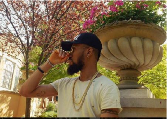 Phyno shows off his biceps tattoos