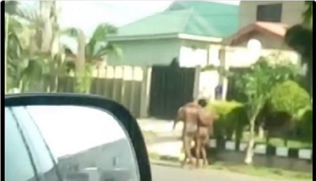 the-two-naked-men-strolling-in-abuja