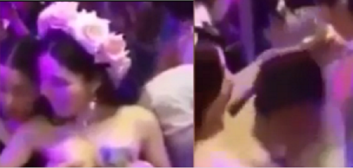 bride-lets-guests-pull-down-dress-and-grope-her-breasts