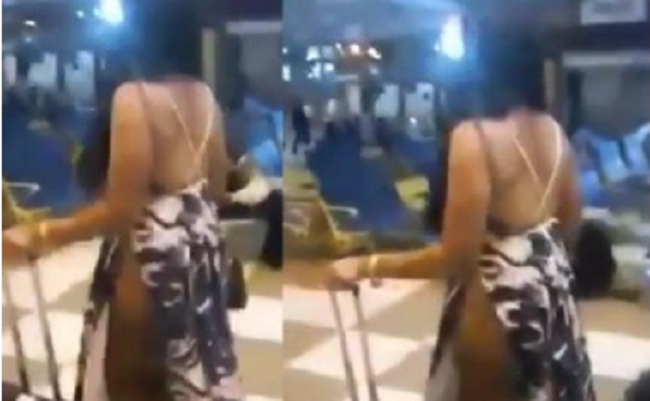 lady-sparks-outrage-with-her-outfit-at-abuja-airport