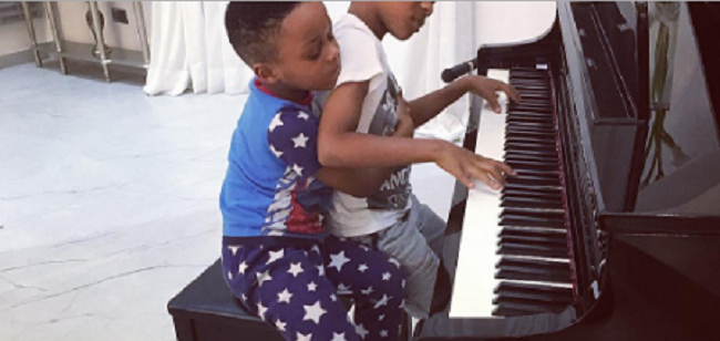 peter-paul-okoyes-sons-playing-the-piano