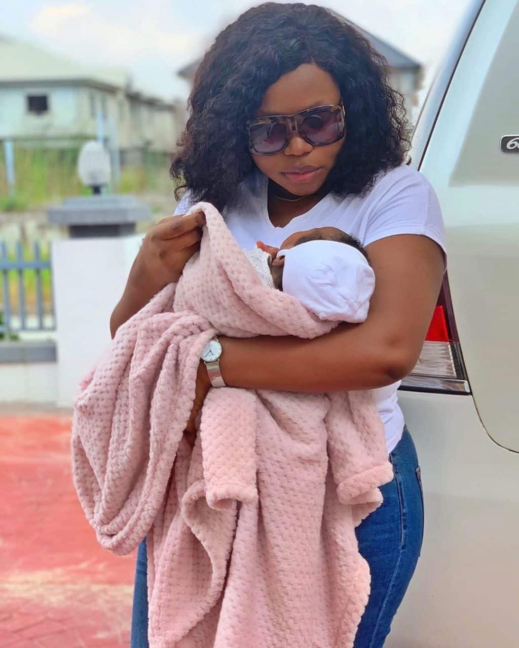 Actress Ruth Kadiri steps out with her baby girl, Reign (Photos)
