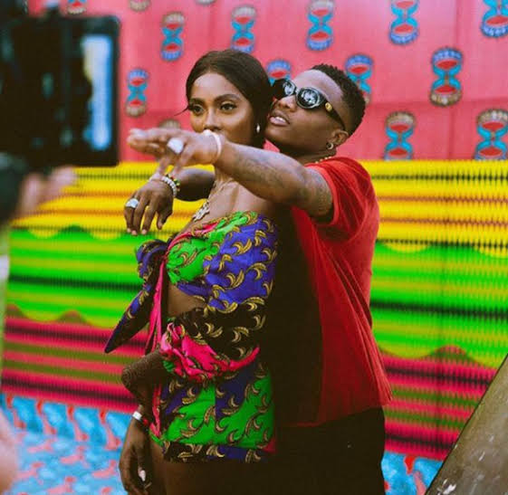 Tiwa Savage clearly unhappy as Wizkid grabs her from behind on stage - See her body language (Video)