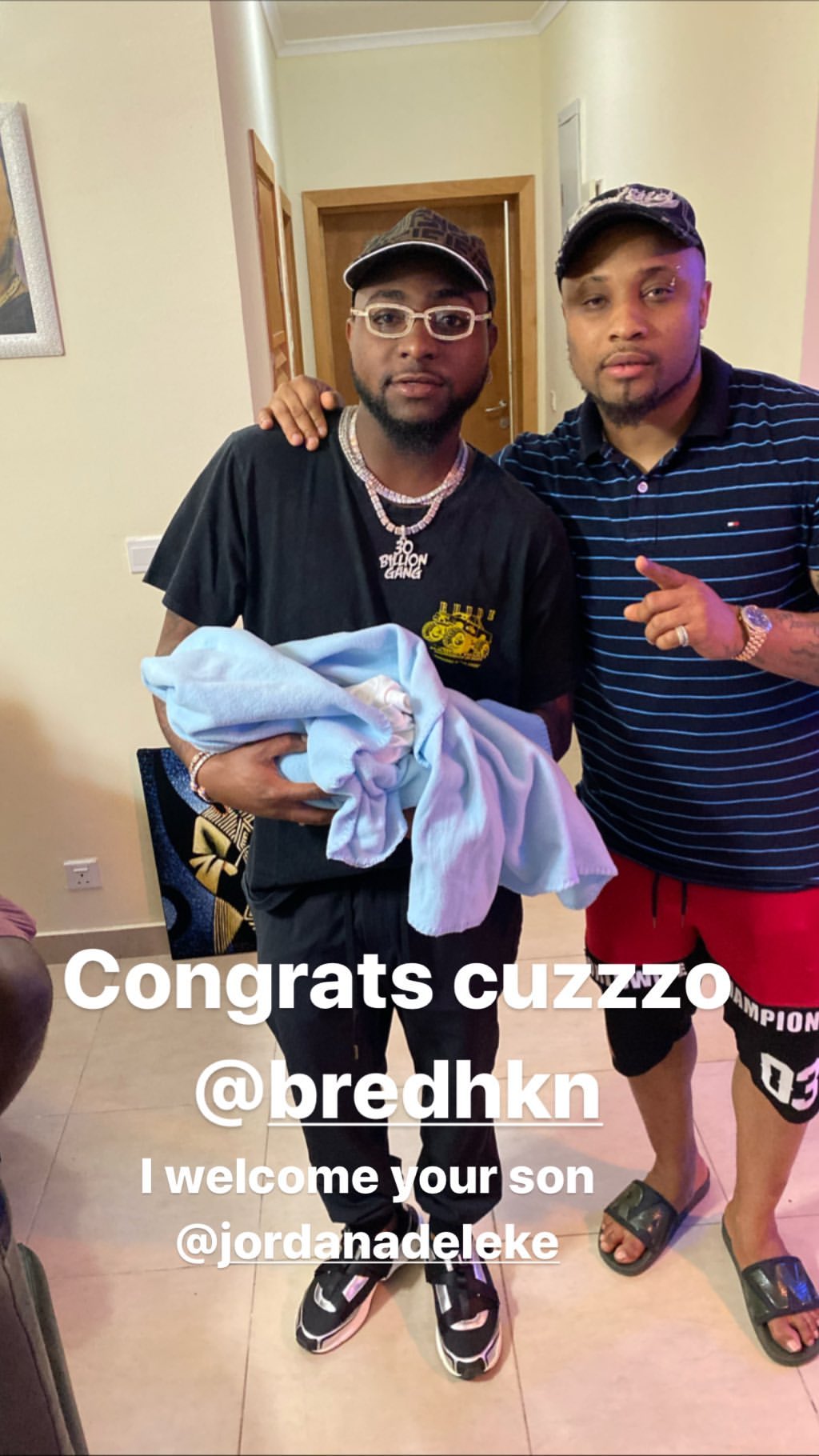 Davido visits B-red, pictured carrying his newborn son (Photos)