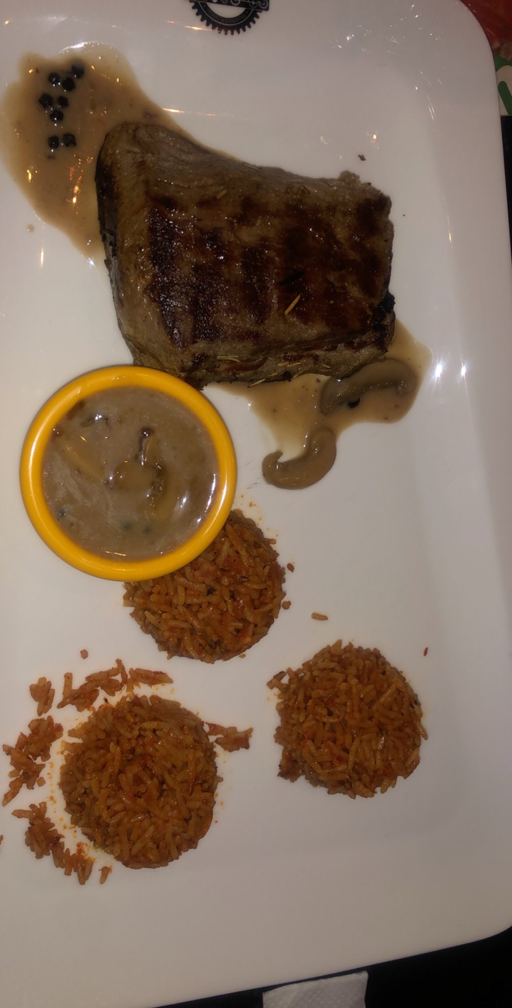 Lady laments over the Jollof rice she bought for N12,000 in an expensive eatery (Photo)