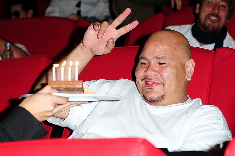 MIAMI - AUGUST 19: Fat Joe is given a cake on his birthday during a listening party for Pitbull's latest release "Rebelution" at Cinebistro on August 19, 2009 in Miami, Florida. (Photo by Gustavo Caballero/Getty Images)
