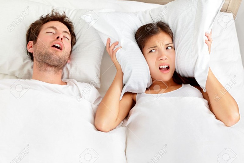 12903069-Snoring-man-Couple-in-bed-man-snoring-and-woman-can-not-sleep-covering-ears-with-pillow-for-snore-no-Stock-Photo