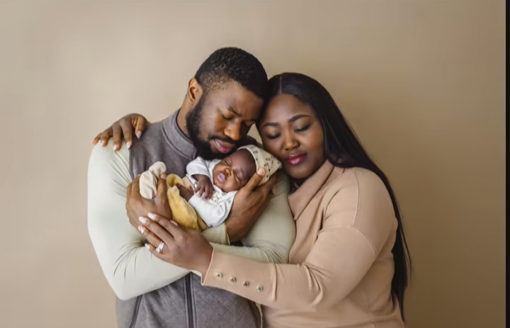 "Dear lord, you do this one!" Stan Nze and wife grateful as they unveils the face of their son (Photos + Video)