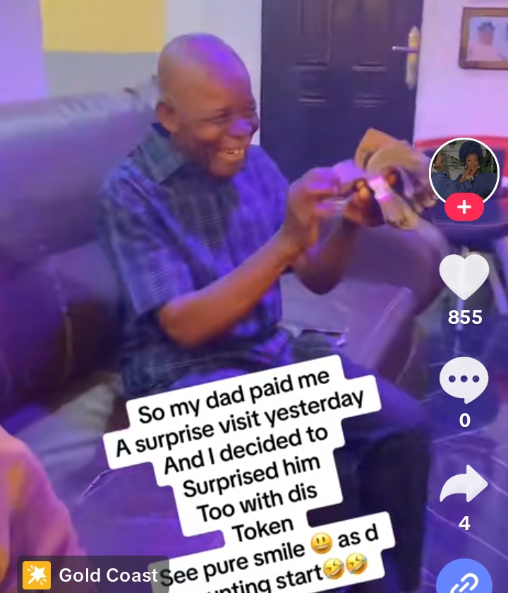“See pure smile on his face” – Lady gifts father wads of cash in video, his reaction melts hearts