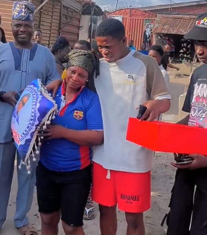Nigerian charcoal-selling mother overwhelmed with emotion as son surprises her with gifts on birthday