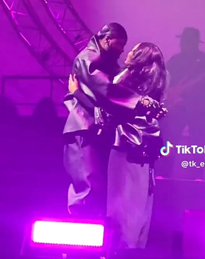 Romantic moment wife of Kizz Daniel joined him on stage, shares kiss as he performs hit song