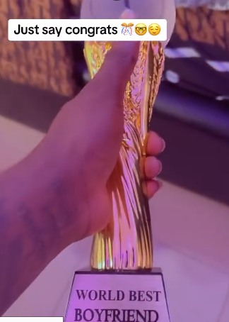 “The award even fine pass AFCON trophy” — Lady gifts her boyfriend a trophy for being the best