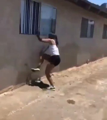 side chick jumping out of window