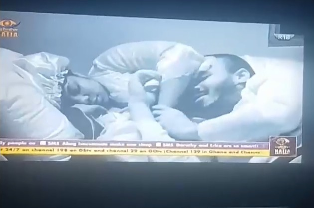 #BBNaija Ozo rests his head on Dorathy’s 'chest' as she rubs his cheeks after a late night discussion video - 