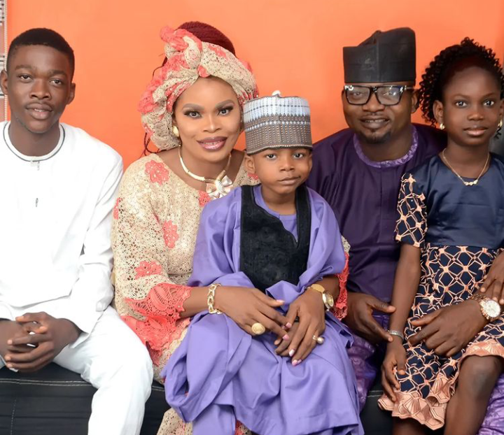 Adekola Tijani, his wife and children