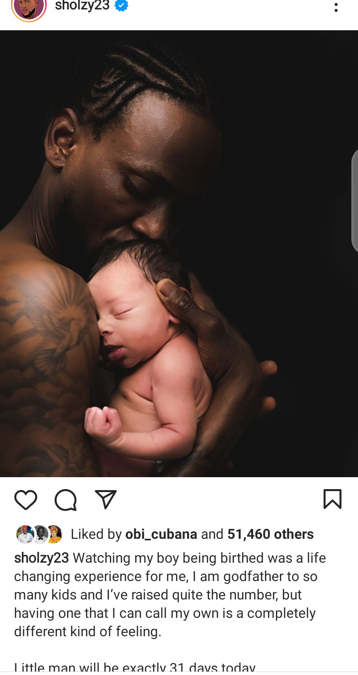 Omashola and his newly born child