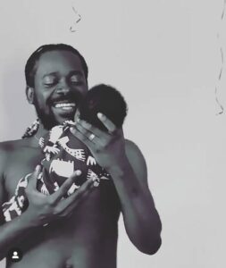 Simi shares adorable video of her hubby, Adekunle Gold rocking their baby, blesses him on Father’s Day