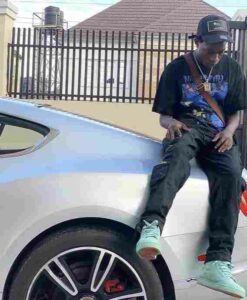 Naira Marley Buys Car Worth N25 Million For 19-Year-Old Brother
