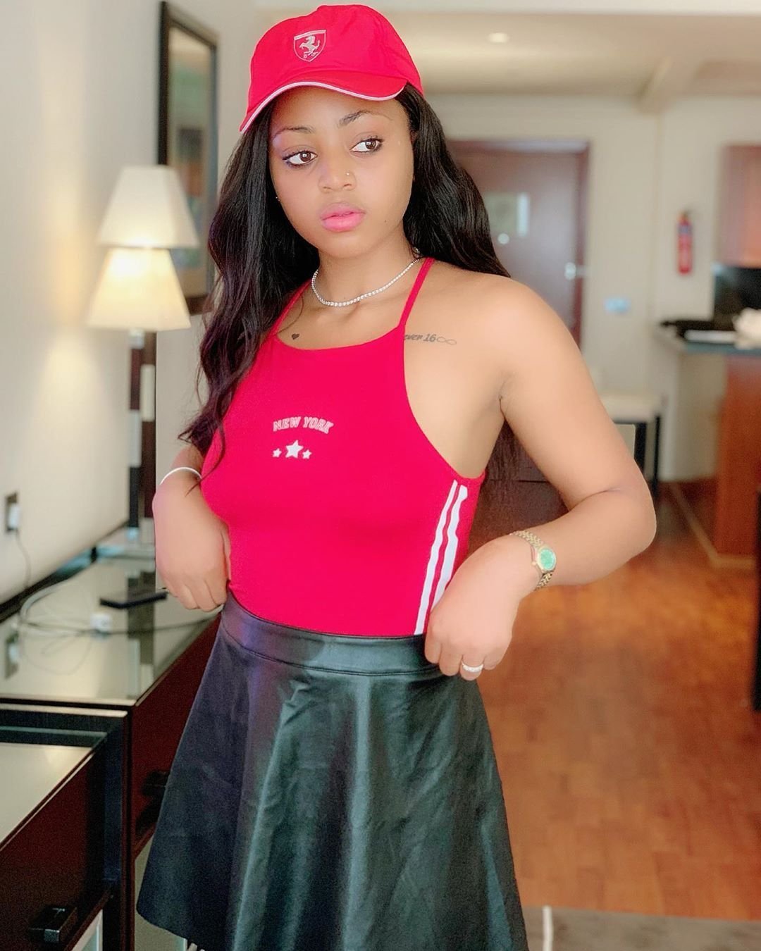 Check out all Regina Daniels’ 7 tattoos and what they mean