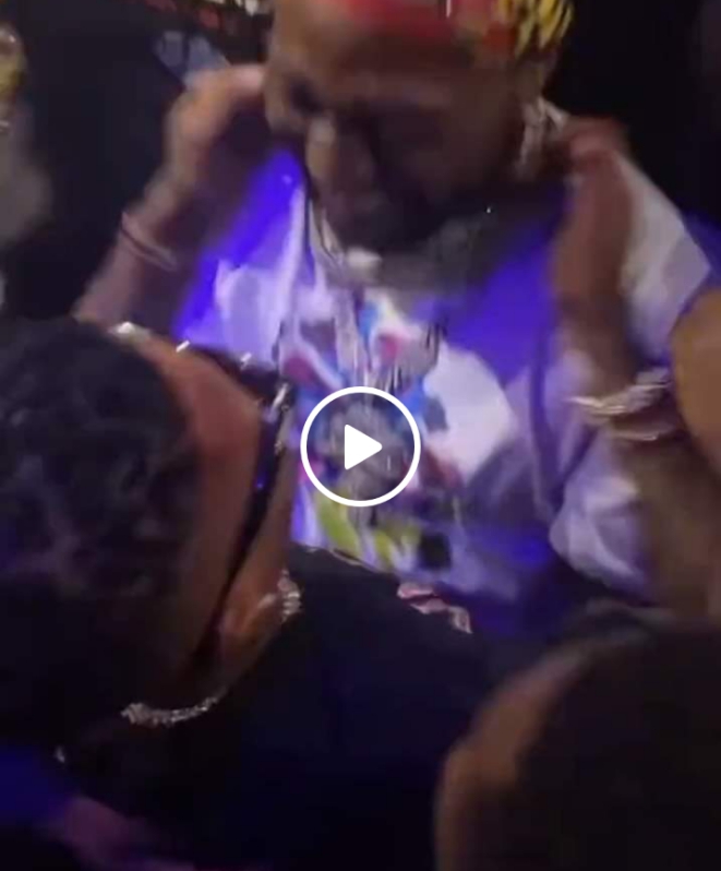 Video of Wizkid and Davido hugging each other