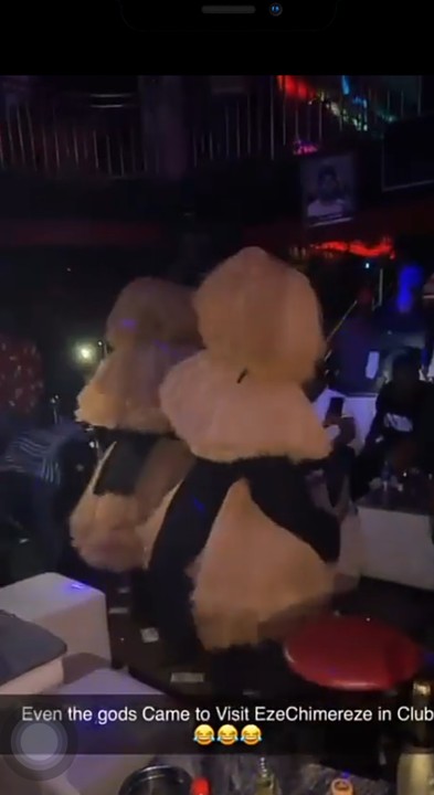 Masquerades show off dance moves in nightclub